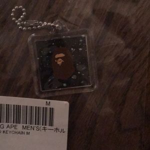 a bathing ape space camp keychain